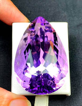 NATURAL PURPLE AMETHYST CUT STONE FROM AFGHANISTAN - 128.40 CTS , 43*27*22 MM